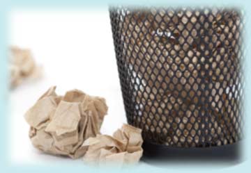 trash can with crumpled packing paper